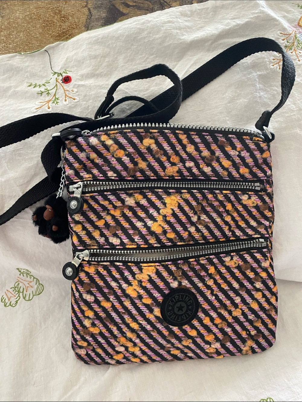 Kipling Pink, Orange & Black Woven Crossbody Bag